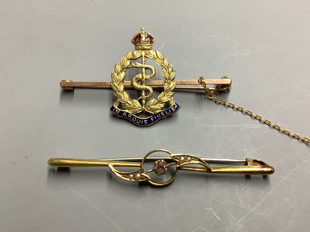 A 15ct gold amethyst and pearl-set bar brooch, gross 2.1 grams, an RAMC 9ct gold and enamel military sweetheart brooch and a pair of 9ct gold and garnet drop earrings